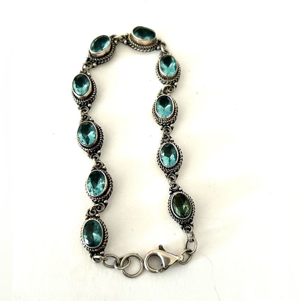 Novica 925 Blue Topaz and Sterling Silver Bracelet